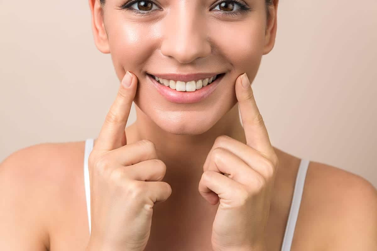 woman makes a new years resolution for her teeth